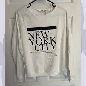Large white New York graphic sweater